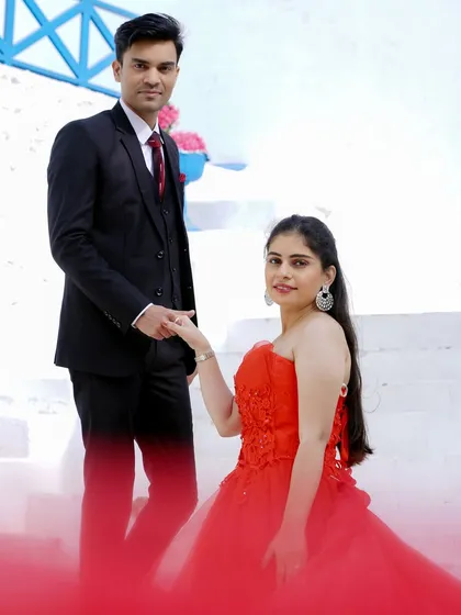 A classic romantic pose from a pre-wedding shoot. The groom holds his bride-to-be, creating a moment of love and promise.