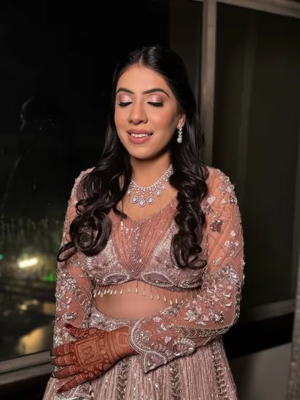 Ankita's moment to sparkle. Her engagement look was effortlessly elegant, with soft smokey eyes and a nude lip, letting her natural radiance shine through.
