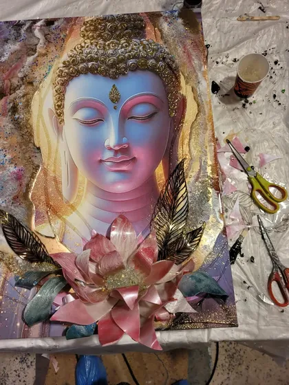 This divine Buddha 3D photo art is another example of what you can create. The workshop covers how to make the lotus and other elements by hand.