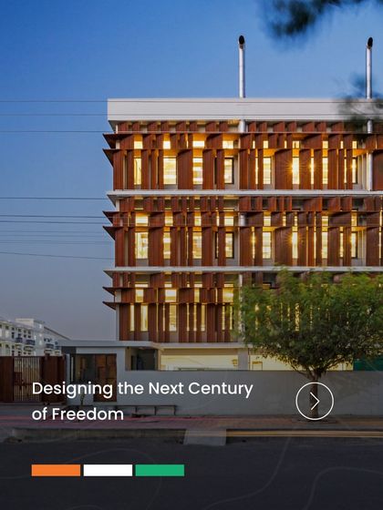 The Visage office in Noida features a climate-adaptive facade with adjustable Corten steel shutters. This design controls the ingress of heat and light, creating a comfortable interior environment while giving the building a dynamic, modern exterior.