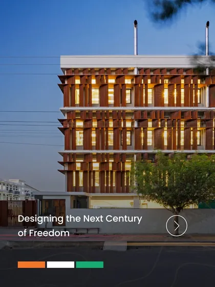 The Visage office in Noida features a climate-adaptive facade with adjustable Corten steel shutters. This design controls the ingress of heat and light, creating a comfortable interior environment while giving the building a dynamic, modern exterior.