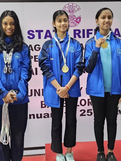 Our Air Rifle women's team on the podium after winning medals at the Nagaraj Rao shooting competition.