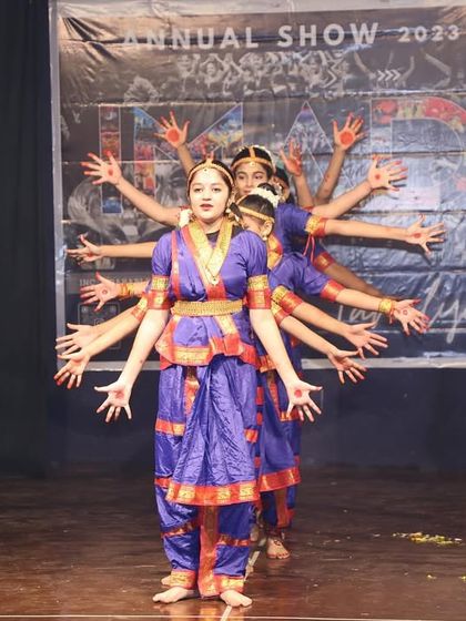 A mesmerizing formation from our Bharatanatyam performance. This classical dance piece highlights the precision, expressions, and traditional costumes of this timeless art form.