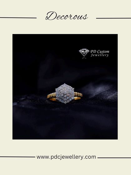 A modern and geometric cocktail ring. This hexagonal-shaped piece is fully paved with diamonds and set in 18kt hallmarked gold, perfect for someone with a contemporary style.