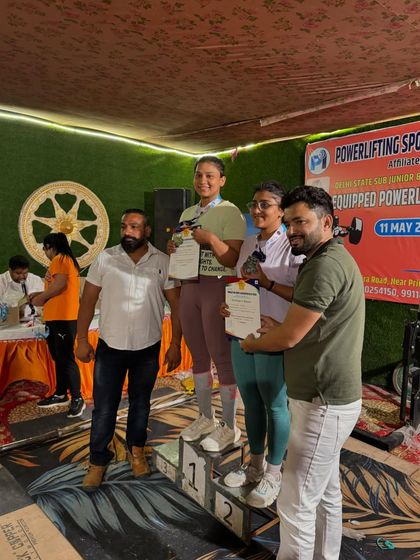 Beena Parihar on the podium, receiving her gold medal at the Delhi State Powerlifting Championship. A well deserved victory.