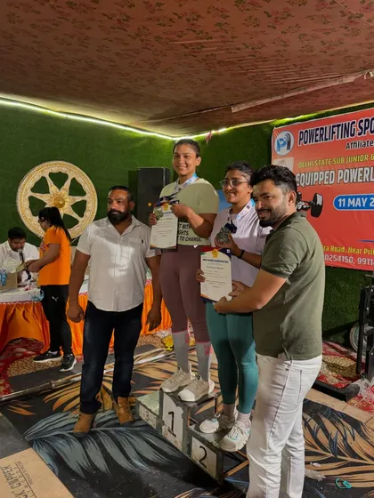 Beena Parihar on the podium, receiving her gold medal at the Delhi State Powerlifting Championship. A well deserved victory.