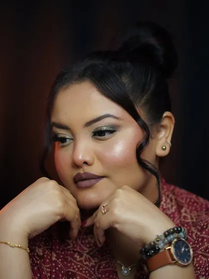 A pensive portrait showcasing a smokey eye look, part of the curriculum in my self-makeup classes.
