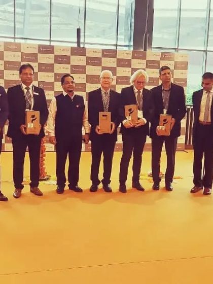 The full panel of dignitaries on stage, marking the official opening of the expo.