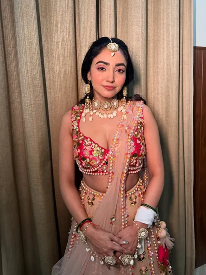 Neha, looking absolutely lovely for her Haldi. We agreed on a minimal look with no falsies or lenses, just fresh, dewy skin and a hint of pink.