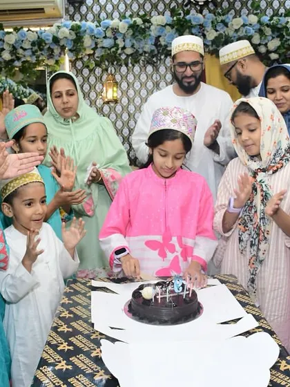 A young girl celebrating her birthday with her family and friends, surrounded by applause and smiles. We are honored to host such precious moments.