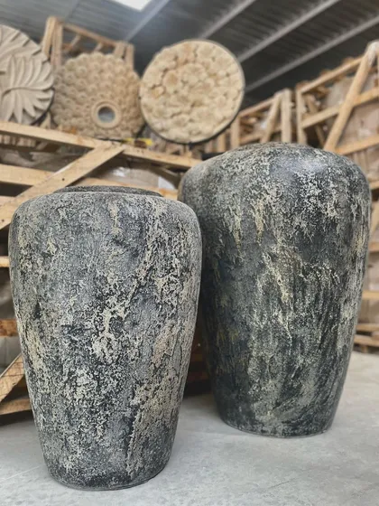 Bold, modern, and undeniably chic. Our 'Charro' GRC planters make a powerful statement with their textured, dark stone finish, offering a contemporary take on classic garden decor for a truly sophisticated look.
