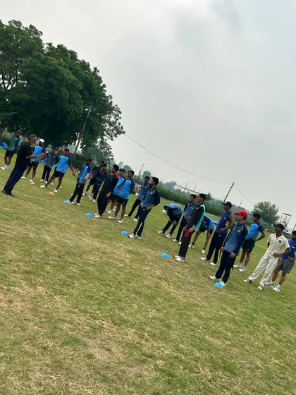 I am instructing the players during a fitness session. Discipline and attention to detail are important in every drill.
