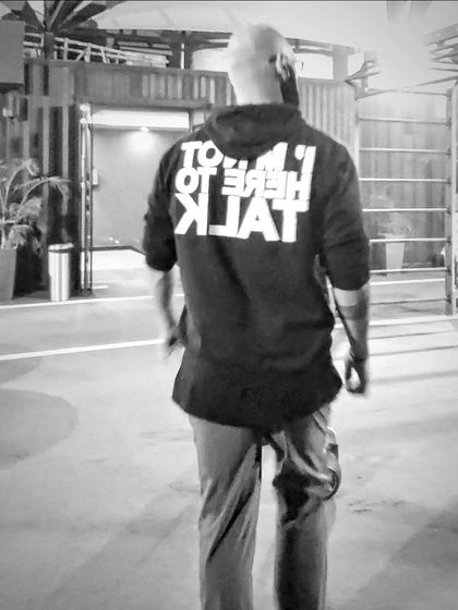 The hoodie says it all. I'm not here to talk. I'm here to WORK. Do what you gotta do.