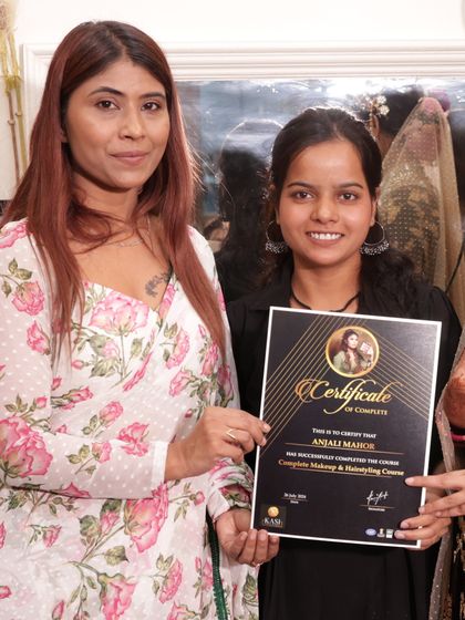 Anjali, another one of my bright students, receiving her certificate.