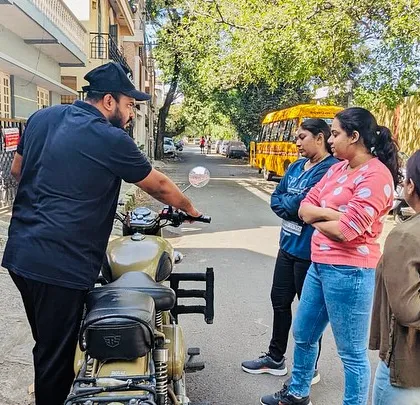 A group of beginners listening to instructions. We start each session with a clear briefing to ensure everyone knows the plan and feels ready for the lesson.