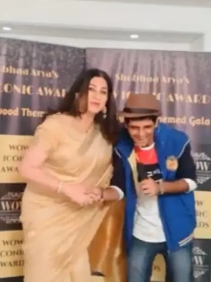 Sharing a laugh with the actress on the red carpet. My interactive style ensures that interviews are more like conversations, making them engaging for everyone.