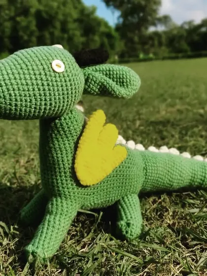 Meet Drogo, the health-conscious dragon. He’s a bit shy but has a big heart. This green amigurumi dragon is ready for adventures and makes a wonderful, soft toy for anyone who loves mythical creatures.
