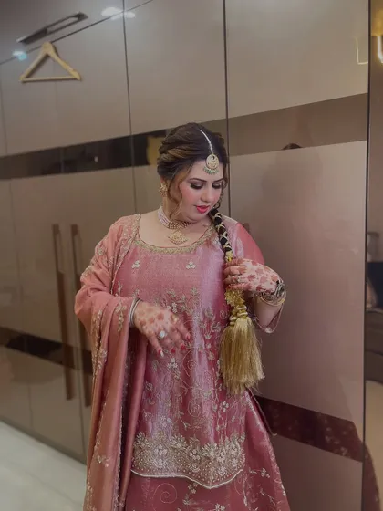 The complete look, showcasing the beautiful silhouette of her traditional Punjabi outfit.