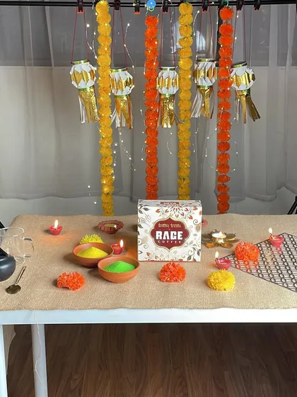 A behind the scenes look at a Diwali setup for a coffee brand. I use festive elements like diyas, rangoli colors, and marigold flowers to create a vibrant and celebratory scene.