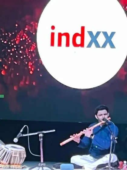 A close-up of our flute and tabla duet on the corporate stage.
