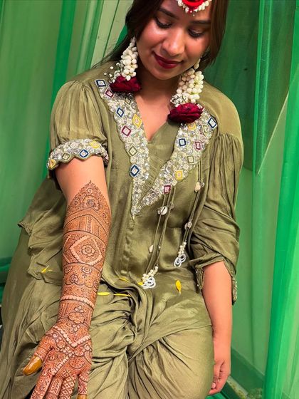 Here is the lovely bride showing off her intricate mehendi. It’s always so rewarding to see the final look come together with her outfit and jewelry.