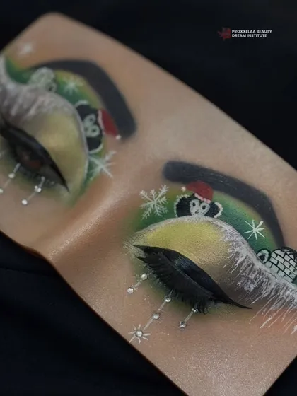 What do you think of this Christmas-inspired eye look? This practice board showcases our students' creativity and holiday spirit.