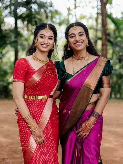 Another beautiful shot of the bride and her sister. It's always fun to create looks for the whole family, ensuring everyone feels their best for the celebration.