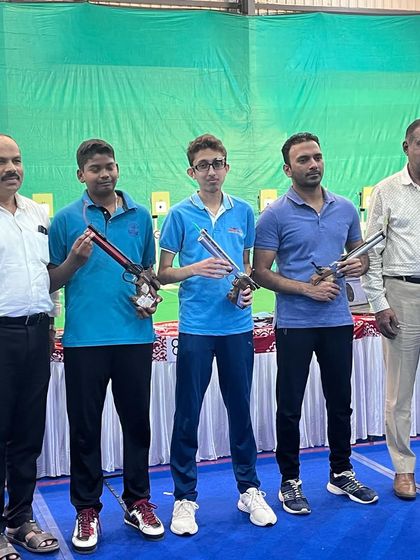 Our successful men's air pistol team at the Tumkur competition.