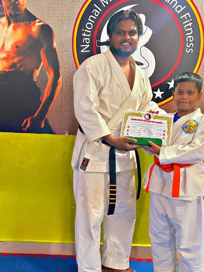 National Martial Arts and Fitness Academy - Kids Martial Arts & Fitness The Journey of Discipline: Belt Graduations photo 22