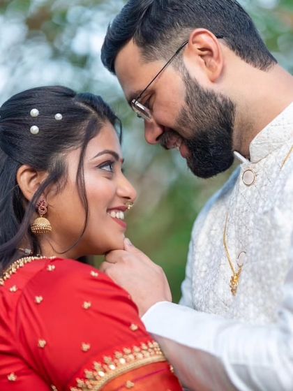 An intimate portrait of the couple, capturing the loving gaze they share. These are the quiet moments that tell the loudest stories of love.