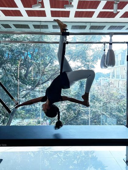 Every day is an opportunity to elevate yourself. This inverted split on the Cadillac is a beautiful demonstration of flexibility and control.