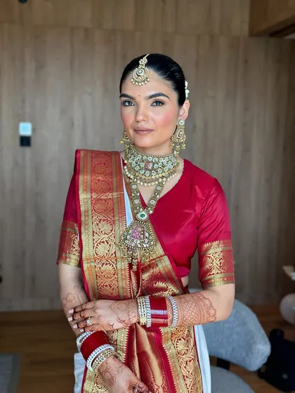 A classic bridal portrait. The makeup is meticulously applied to ensure it looks perfect from every angle and lasts all day.