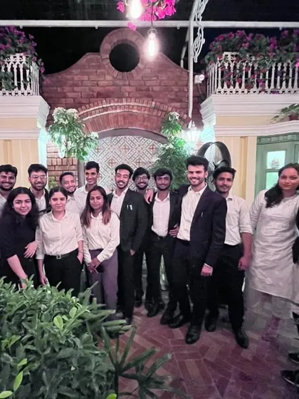 The team at an evening event. We work hard and believe in celebrating our successes together.