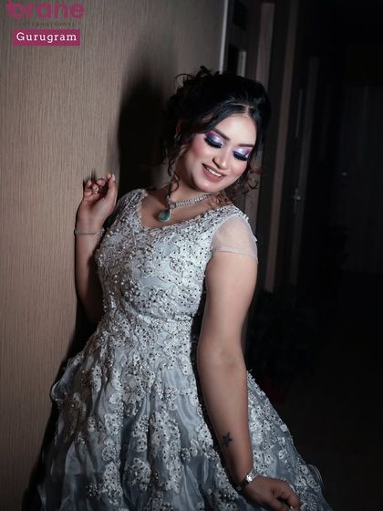 A full length view of the glamorous gown look. My portfolio shoots give students the chance to see their work in a complete, styled context.