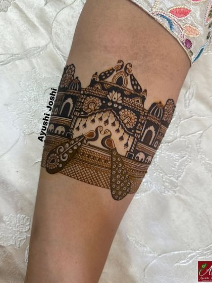 The palace gate design now filled with intricate patterns and shading. This shows the transformation from a simple line drawing to a rich, textured piece of art.