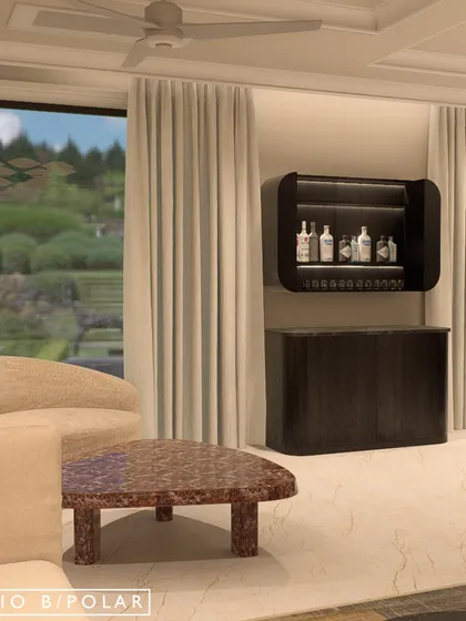 A compact and stylish bar unit is integrated into the living area, providing a dedicated space for entertaining without disrupting the flow of the room.
