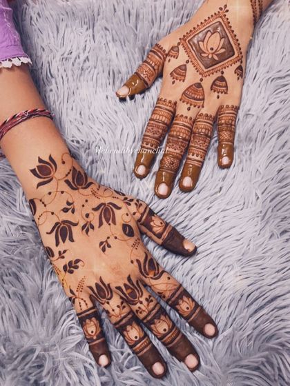 A comparison of two different styles for Diwali: a modern lotus vine and a more traditional geometric design.