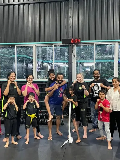 I love bringing the whole community together. This was a fantastic self-defense workshop where I invited parents and grandparents to join the kids, making learning safety skills a memorable family event.