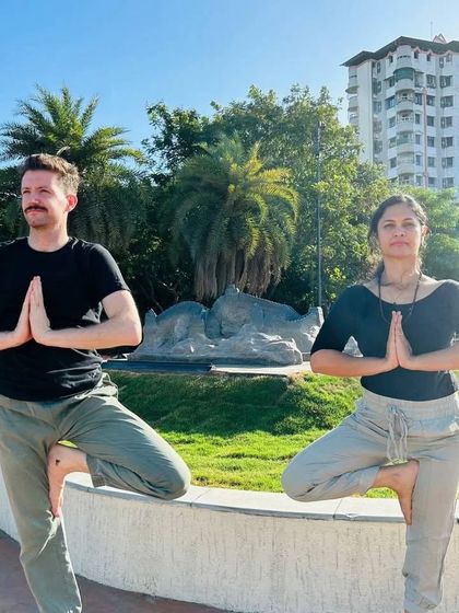 Striking a Vrikshasana, or tree pose, on International Day of Yoga. This posture represents balance and stability, two key benefits that come from a regular yoga practice.