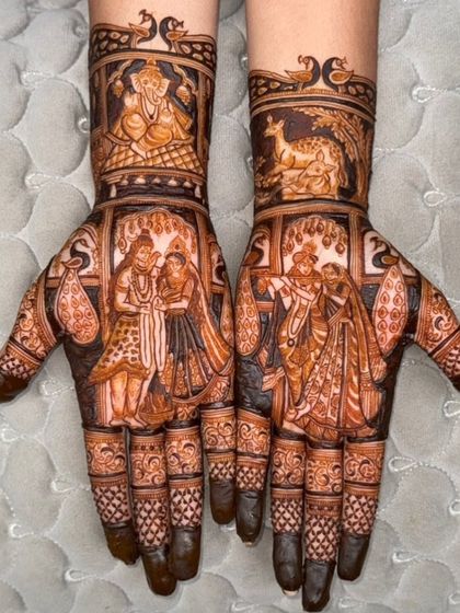 A divine storytelling mehendi featuring Lord Ganesha, Radha-Krishna, and a varmala scene, combining blessings with the couple's story.