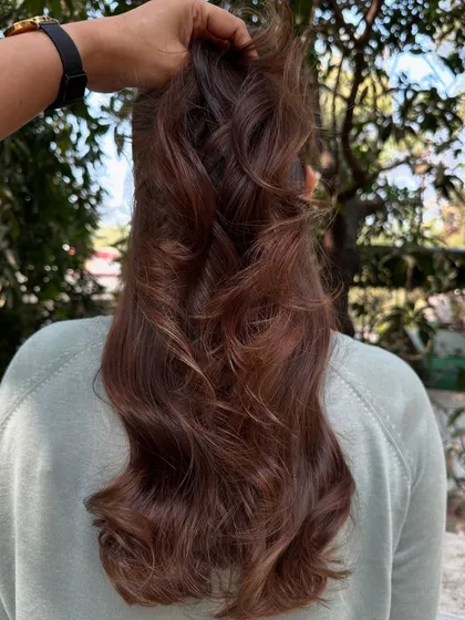 This is my 'Chocolate Pecan Dream' creation. We started with a faded base and gave her this incredibly rich, warm brown with delicate pecan highlights. The result is a glossy, healthy-looking color that’s perfect for any season.