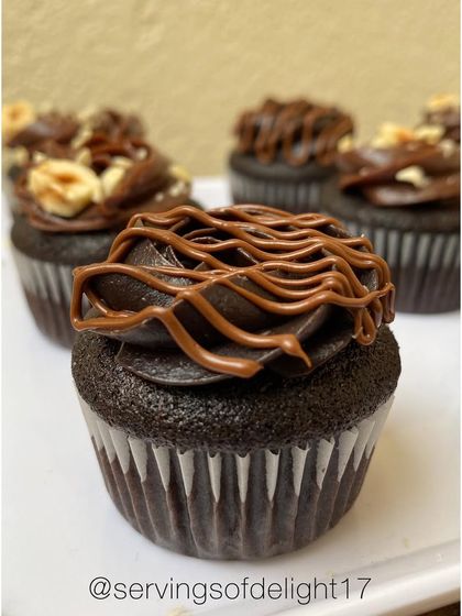 A close-up of my bite-sized Nutella cupcakes. These are a huge hit, with a rich chocolate base and a hazelnut-chocolate frosting.
