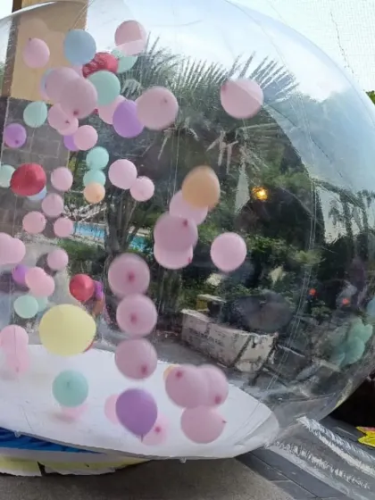 My transparent inflatable igloo is a unique rental that always gets a lot of attention. I can fill it with balloons, as shown here, to create a whimsical photo spot or a fun play area for kids at your party.