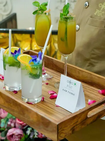 We believe every detail matters, including the welcome drinks. Our refreshing Aam Panna mocktails, garnished with fresh mint and edible flowers, offer a delightful and cooling start to any celebration.