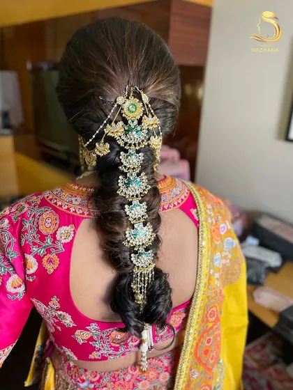 A close-up of the intricate braid jewellery, a perfect statement piece for a bride.