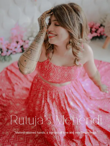 A beautiful high-angle shot of the bride looking radiant in her pink outfit. The text overlay highlights that these are memories from her special Mehndi day.