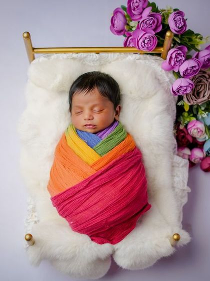 A rainbow of love. This colorful swaddle is a beautiful way to celebrate your rainbow baby, keeping them snug and secure while they sleep.