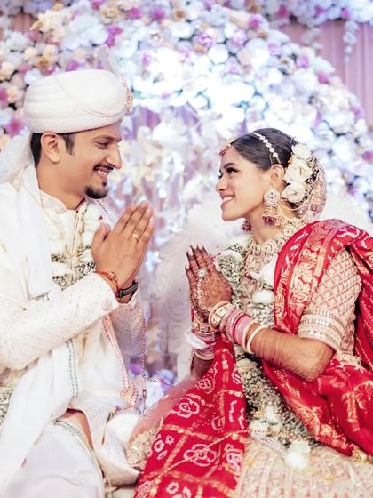 A moment of shared respect and tradition during Nupur and Chinmay's wedding ceremony. I make sure to capture the significant rituals that are central to your day.