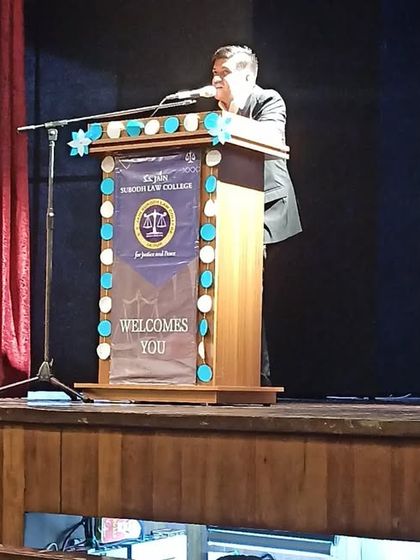 At the podium, sharing my experiences and insights with the students of S.S. Jain Subodh Law College.