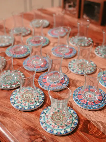 Traditional Turkish tea glasses, adding an authentic touch to a themed Mehendi party. I source unique elements to make every event concept feel genuine.
